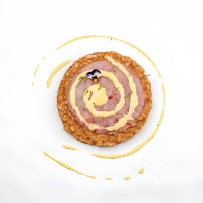 Risotto impiattato preparato con il riso Carnaroli